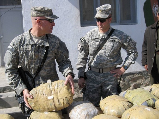 Opium poppy and us forces in Afghanistan的圖片搜尋結果